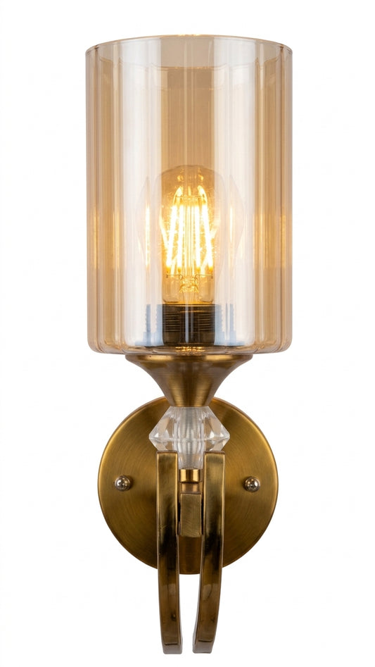 Front pacing profile of the wall light led with gold finish being shown with a cylindrical galss on top