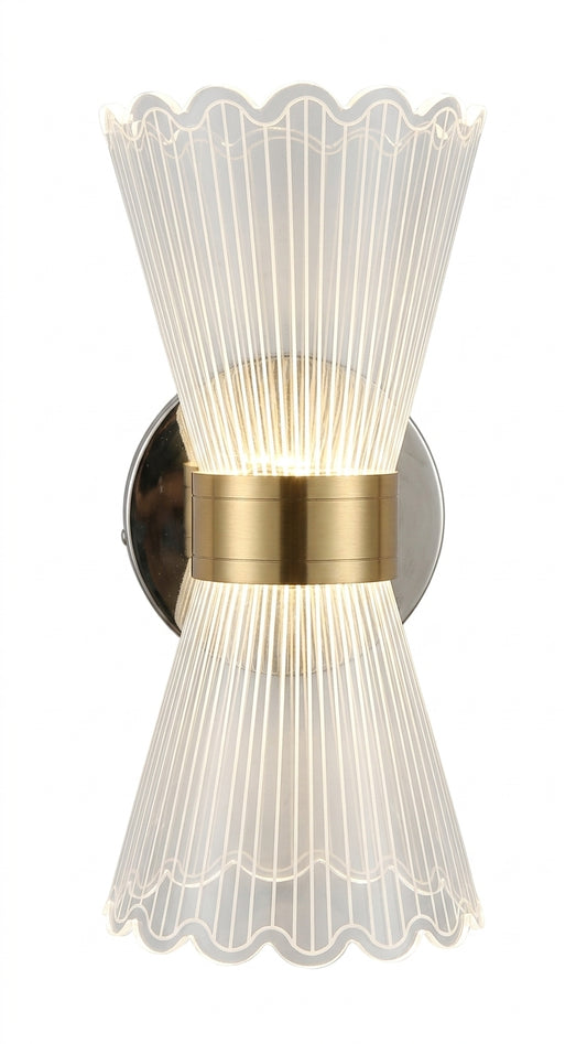 Hourglass LED wall sconce with fluted crystal shades and brushed brass center band on white background