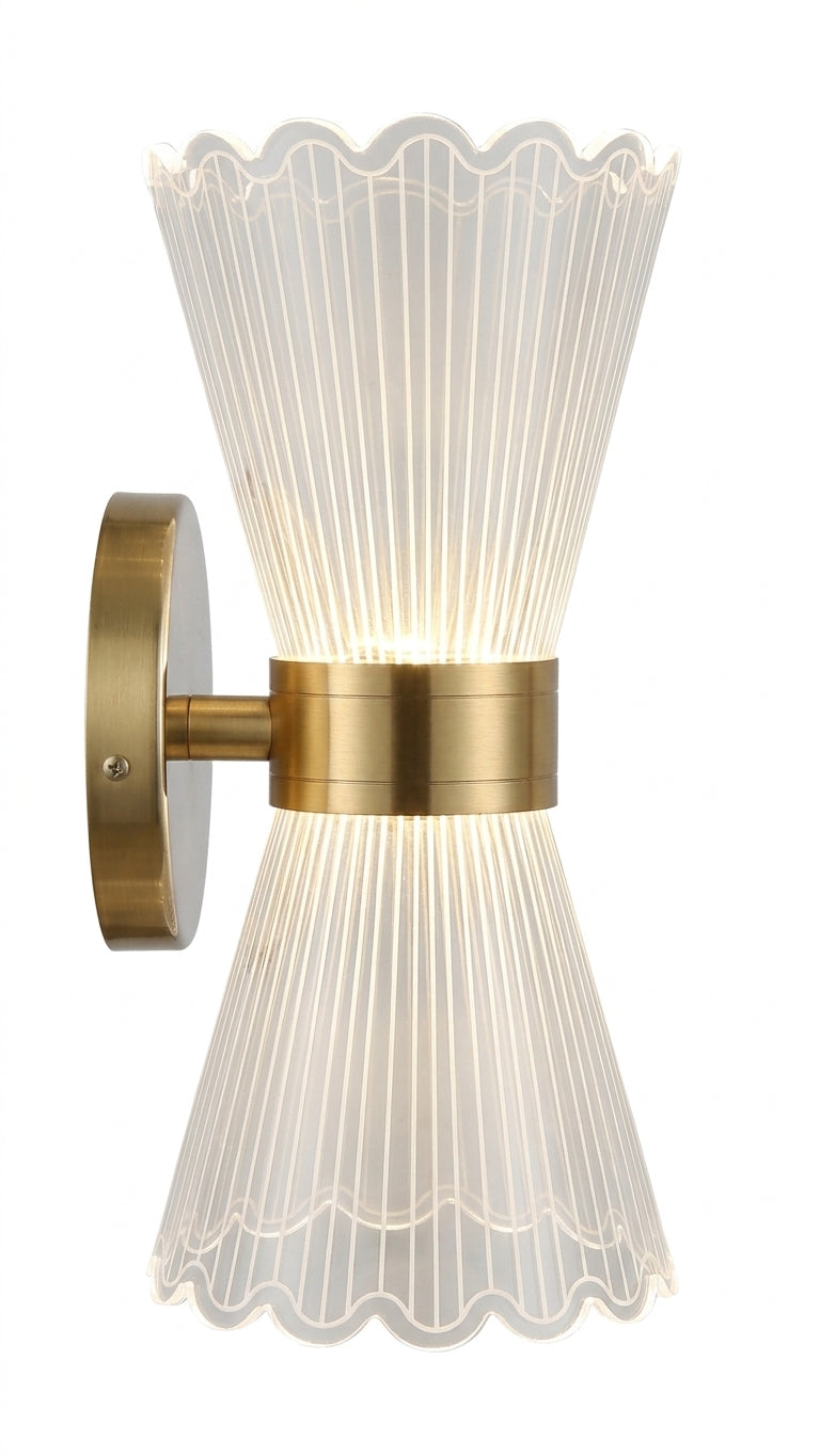 Hourglass LED wall sconce with fluted crystal shades and brushed brass center band on white background from the side.