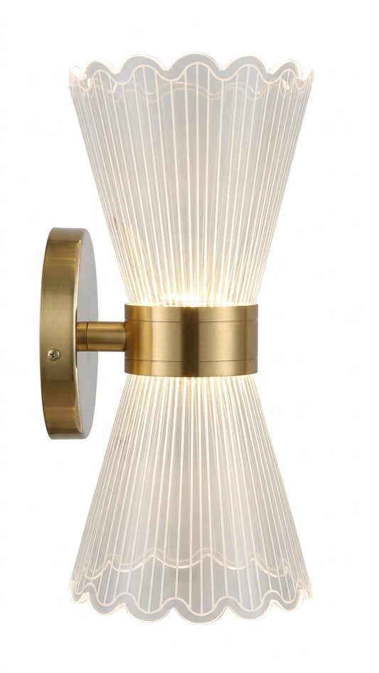 Hourglass LED wall sconce with fluted crystal shades and brushed brass center band on white background from the side.