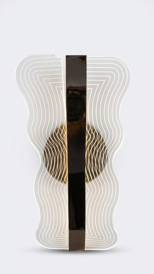 Waveform textured acrylic & gold LED wall sconce with rippled light-diffusing panel front face.